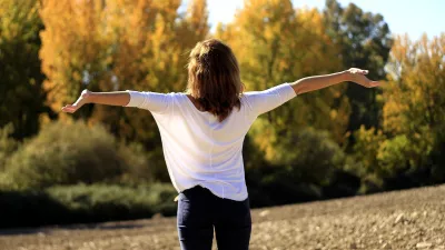 Woman in autumnal landscape